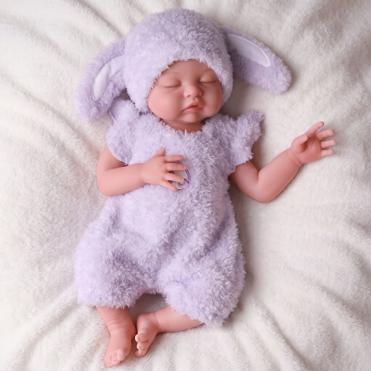 Nancy doll full body in purple fluffy bunny romper