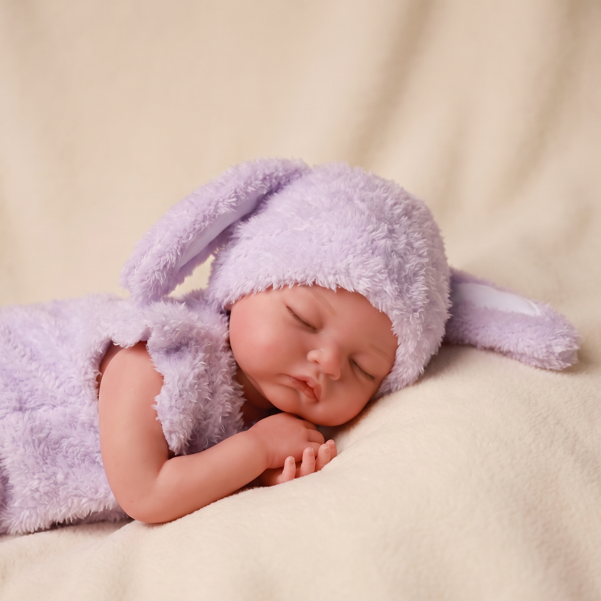 Nancy doll in purple fluffy bunny outfit