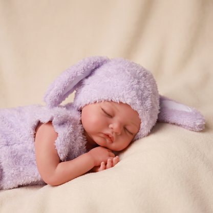 Nancy doll in purple fluffy bunny outfit