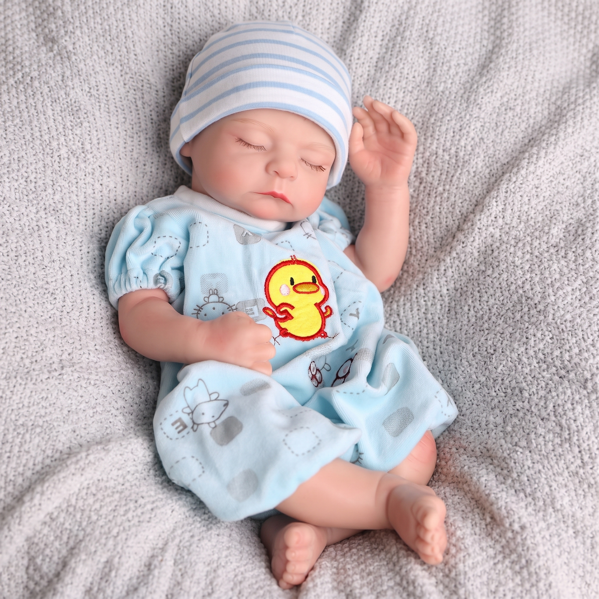 Noah doll full body in baby blue duck romper