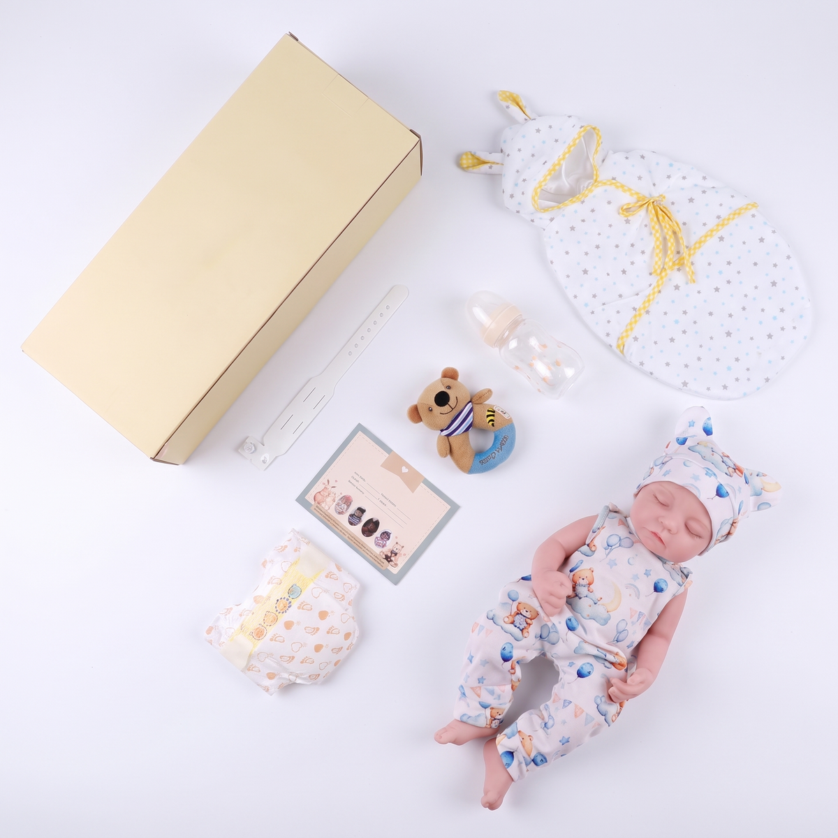 Everything included with Noah - gift box, swaddle and accessories