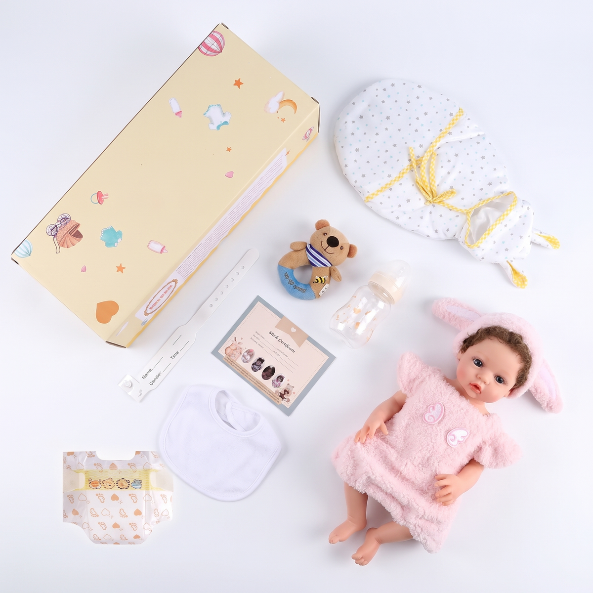 Everything included with Phoebe - gift box, swaddle and accessories