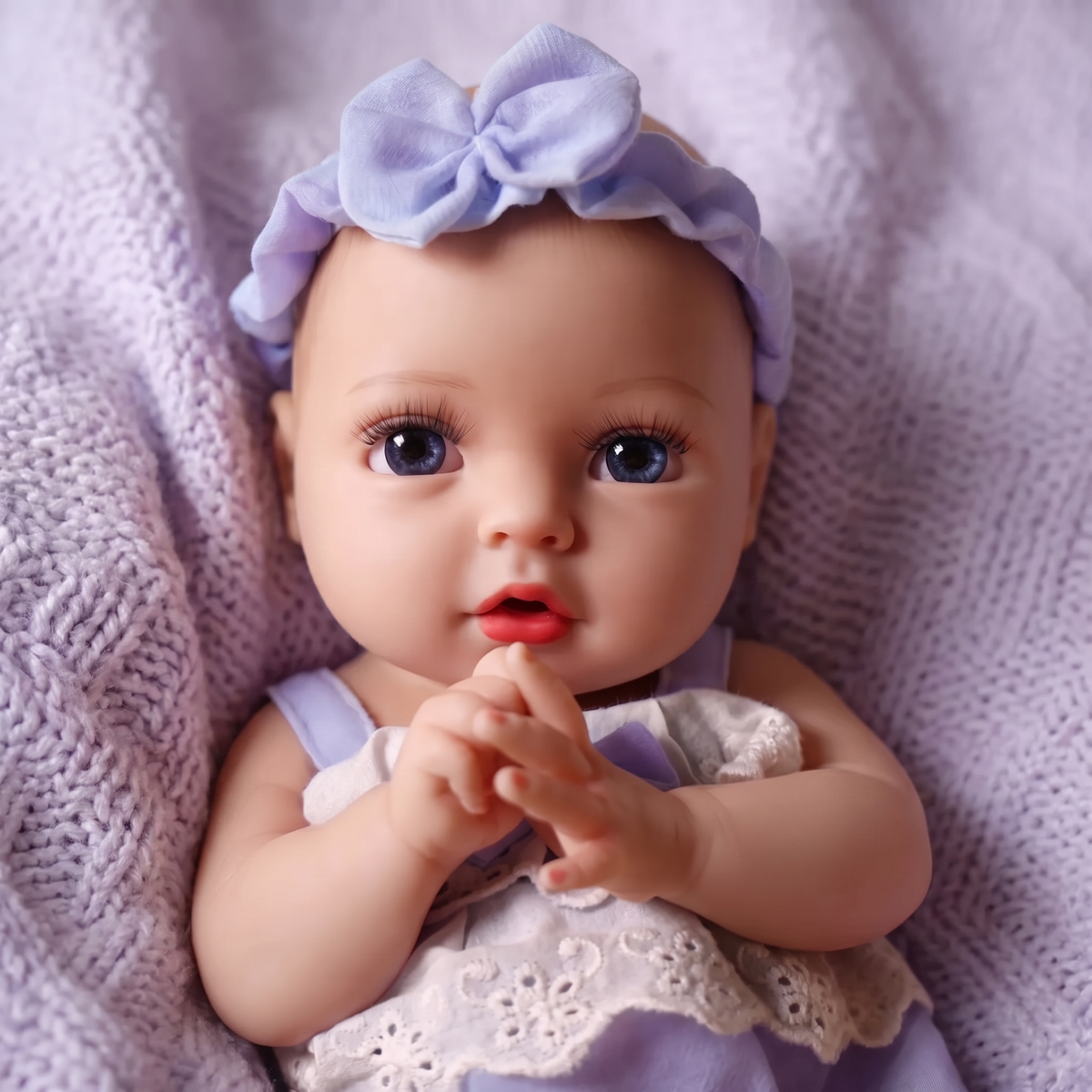 Terry doll in purple bow headband